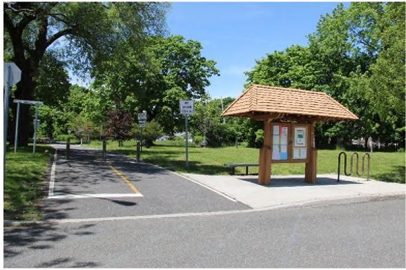 bike rack at a park near trail map